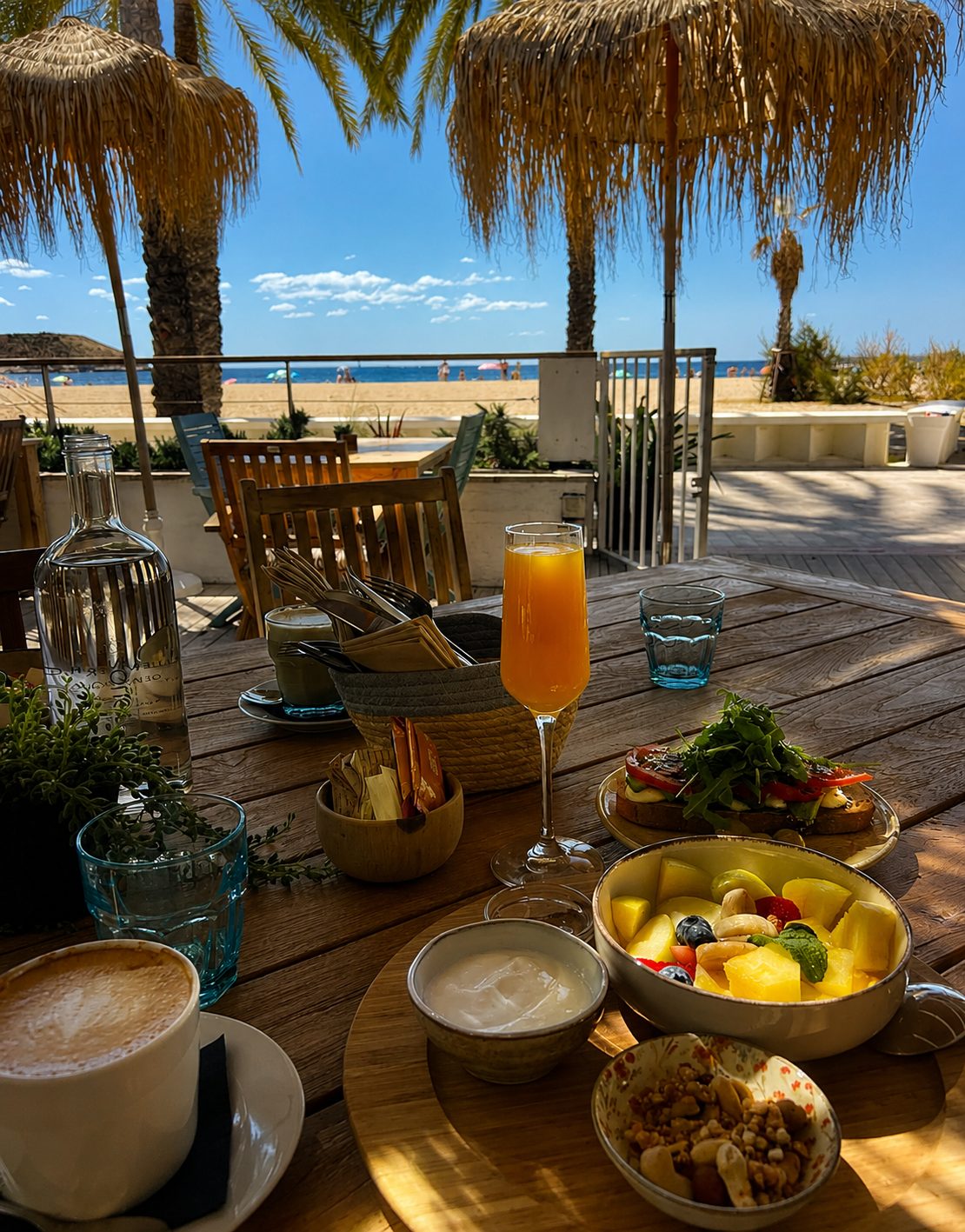 Brunch spread on a table with sea views