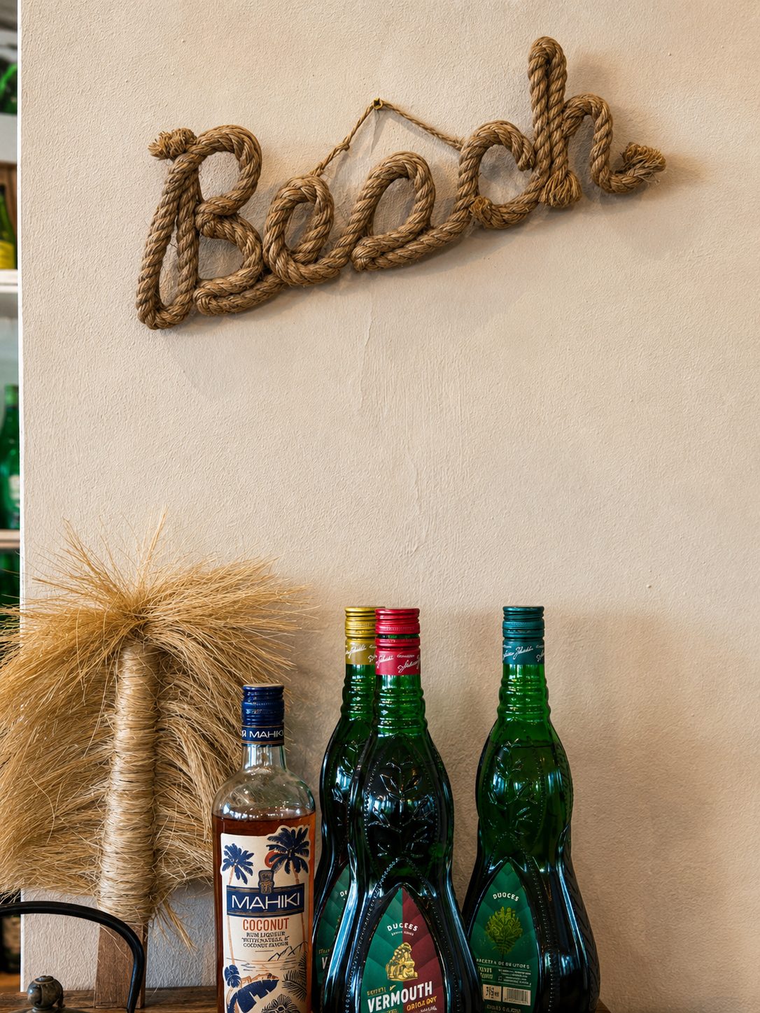Handmade Beach rope sign above the bar