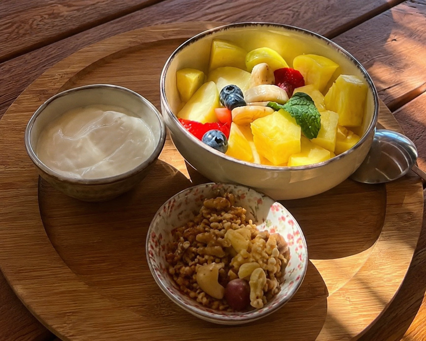 Fresh fruit bowl with yogurt and granola